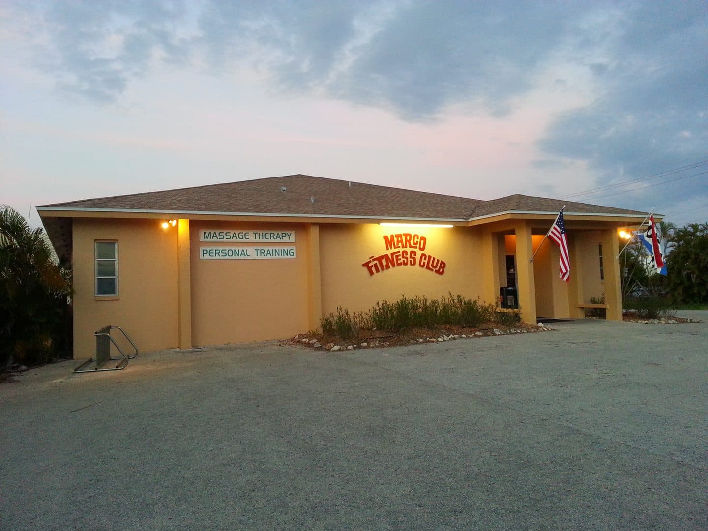 Marco Fitness Club building at dusk, 871 East Elkcam Circle, Marco Island